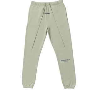 Fear Of God Essentials sweater pants in olive green